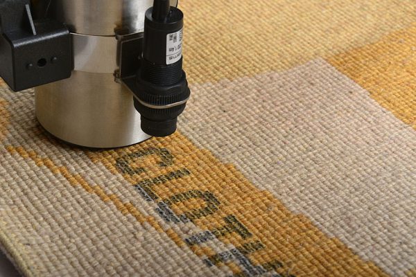 Large character on the carpet Inkjet Coding Device